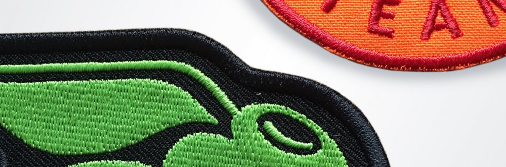 Embroidered patch with embroidered border