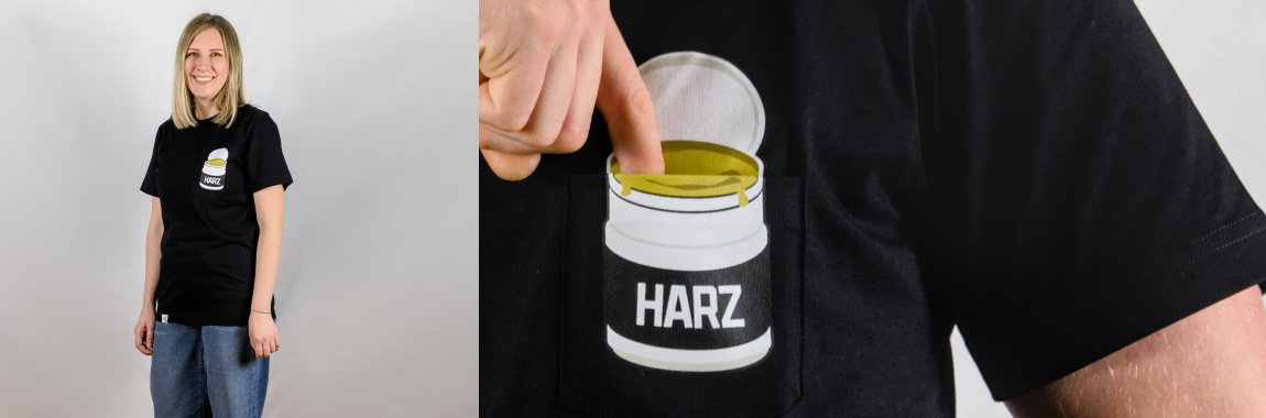 Frau in schwarzem T-Shirt mit bedruckter Brusttasche; Detailaufnahme des Farbtopf-Motivs mit dem Schriftzug HARZ